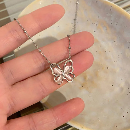 Halskette mit Kreuzanhänger im neuen Design mit rosa Zirkonia