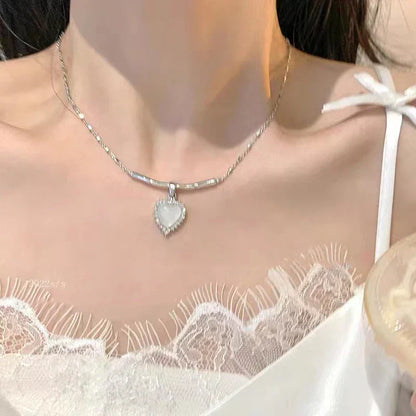 Halskette mit Kreuzanhänger im neuen Design mit rosa Zirkonia
