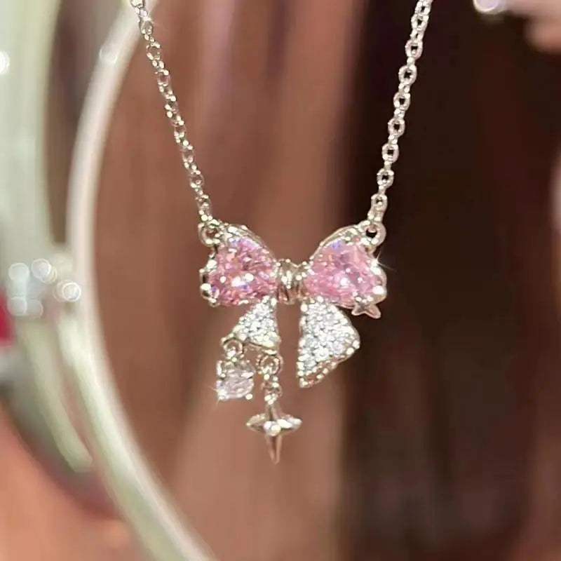 Halskette mit Kreuzanhänger im neuen Design mit rosa Zirkonia